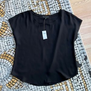 Silk chiffon scoop neck shirt with small detail around the neck and sleeves